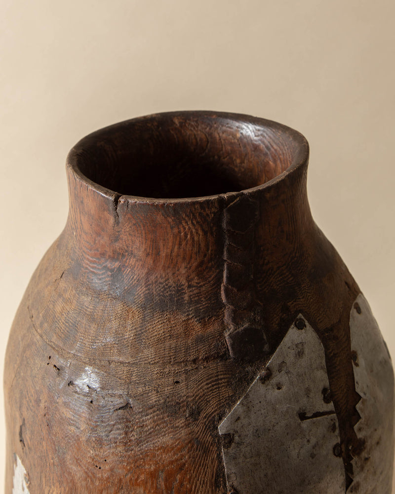 Large Carved Wooden African Milk Jar with Metal Patches