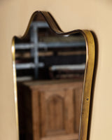 Sculptural brass framed mirror, Italy, circa 1960
