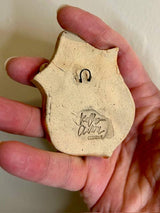 Cat on a Plaque