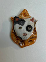 Cat on a Plaque