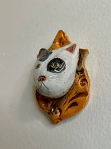 Cat on a Plaque