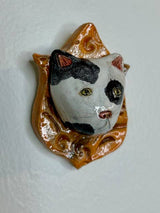 Cat on a Plaque