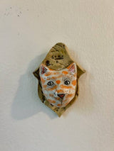 Cat on a Plaque