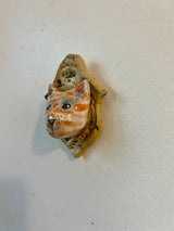 Cat on a Plaque