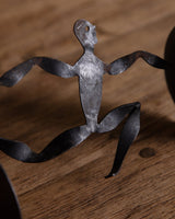 Hand Formed Iron Balancing Man Candle Holder - Lone Fox
