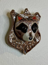 Raccoon on a Plaque - Lone Fox